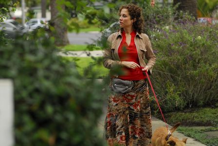 Carla Tassara as Molly, the neighbor in 