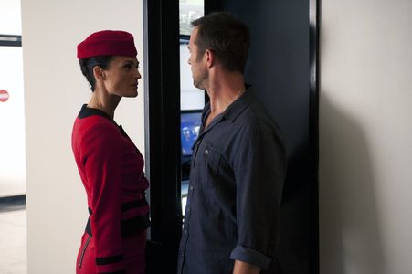 Sullivan Stapleton and Lyne Renée in Strike Back (2010)