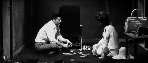 Ryô Ikebe and Mariko Kaga in Pale Flower (1964)