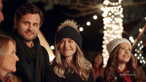 Lea Thompson, Lyndsy Fonseca, Nicholas Delany, and Paige Herschell in Next Stop, Christmas (2021)
