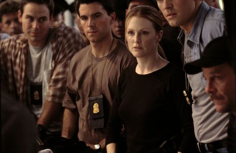 Julianne Moore, Boyd Kestner, Renne Gjoni, and Peter Shaw in Hannibal (2001)