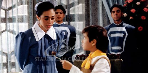 Tom Taus and Susan Lozada in Cedie (1996)
