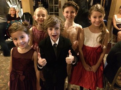 Madeline Hirvonen, Luke Roessler, and Islie Hirvonen on the set of 