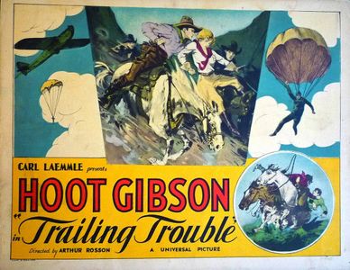 Hoot Gibson and Margaret Quimby in Trailing Trouble (1930)