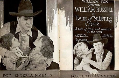 Malcolm Cripe, Louise Lovely, William Russell, and Helen Stone in Twins of Suffering Creek (1920)