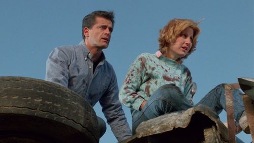 Victoria Scott and Robert North in Blades (1989)