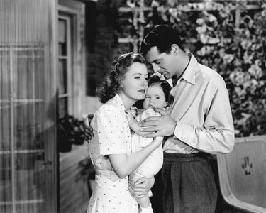 Cary Grant, Irene Dunne, and Jane Biffle in Penny Serenade (1941)