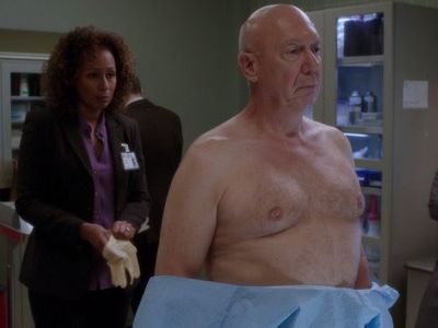 Dann Florek and Tamara Tunie in Law & Order: Special Victims Unit (1999)