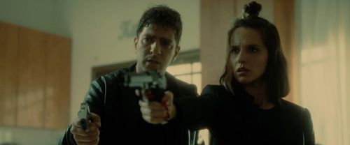 Moshe Ashkenazi and Yana Yossef in Unorganized Crime (2022)