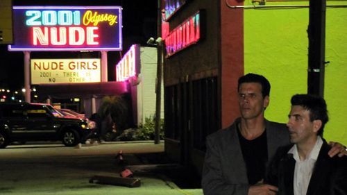 Flo the muscle for the mob roughs up Demetri in a dark alley in Tampa, Fl. His message to Demetri is to do the hit or el
