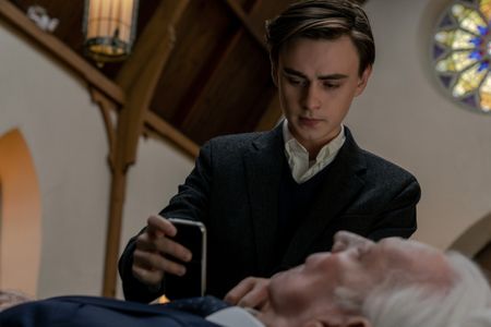 Donald Sutherland and Jaeden Martell in Mr. Harrigan's Phone (2022)