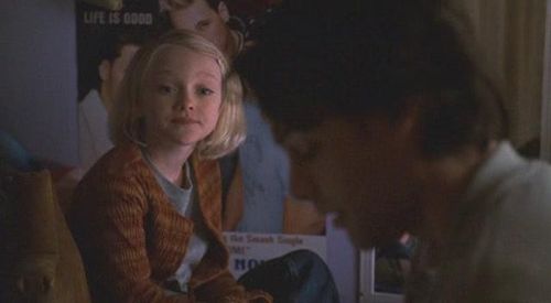 Dakota Fanning and Adam Kaufman in Taken (2002)
