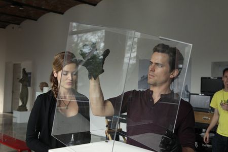 Matt Bomer and Gloria Votsis in White Collar (2009)