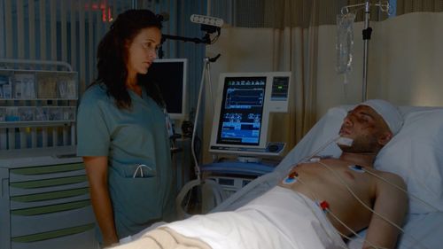 Janet Kidder and Artin John in The X-Files (1993)