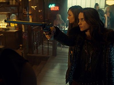 Melanie Scrofano and Dominique Provost-Chalkley in Wynonna Earp (2016)