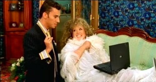 Alla Pugacheva and Maksim Galkin in Za dvumya zaytsami (2003)