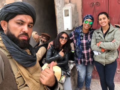 Still of Mustafa Haidari & crew members on set