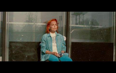 Picture capture of Iris Karina in Elton John's music video Tiny Dancer