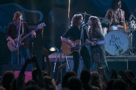 Riley Keough, Josh Whitehouse, Sam Claflin, and Sebastian Chacon in Daisy Jones & The Six: Track 10: Rock 'n' Roll Suici