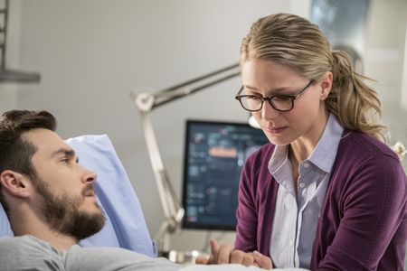 Melissa Benoist and Chris Wood in Supergirl (2015)