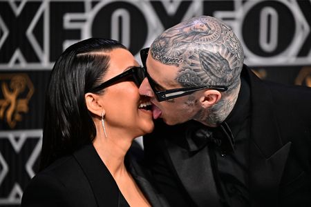 Travis Barker and Kourtney Kardashian at an event for The 75th Primetime Emmy Awards (2024)