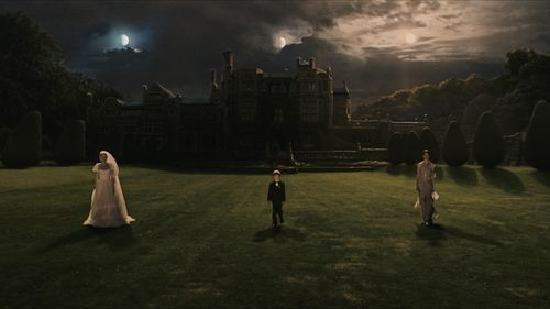 Kirsten Dunst, Charlotte Gainsbourg, and Cameron Spurr in Melancholia (2011)