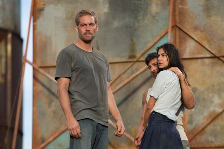 Paul Walker, David Belle, and Catalina Denis in Brick Mansions (2014)