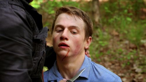 Still of Hunter Foretich and Simon Phillips in Dystopia (2019)