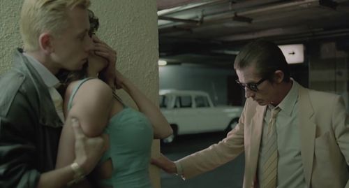 John Hurt, Tim Roth, and Laura del Sol in The Hit (1984)