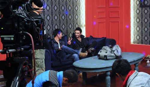 Christian Bachini chilling on the set of crime film Jie Jin (2014)
