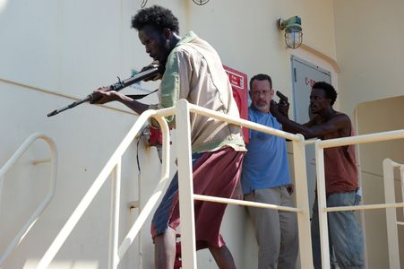 Tom Hanks, Faysal Ahmed, and Mahat M. Ali in Captain Phillips (2013)