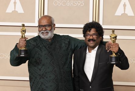 Chandrabose and M.M. Keeravani at an event for RRR (2022)
