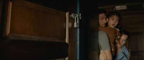 Kristen Cui, Jonathan Groff, and Ben Aldridge in Knock at the Cabin (2023)