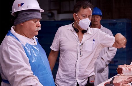 Writer / Director Carlos Avila (center) works out the staging for a scene from 'The Kill Floor.'