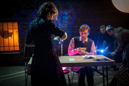 Mikaela Euro (left) and Michael William Hunter (right) getting all futuristic-looking with glow wristbands on the set of