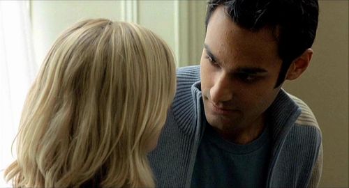Eva Birthistle and Atta Yaqub in A Fond Kiss (2004)