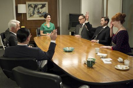 Jon Hamm, Jared Harris, Christina Hendricks, Vincent Kartheiser, Robert Morse, John Slattery, and Sadie Alexandru in Mad