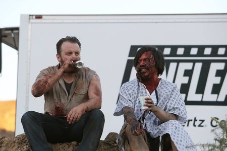 Sean Sprawling and Simon Phillips take a break on set of 