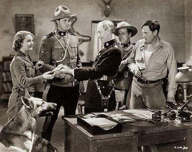 Francis X. Bushman Jr., George Chesebro, Earl Dwire, Robert Walker, Lois Wilde, and Rin Tin Tin Jr. in Caryl of the Moun