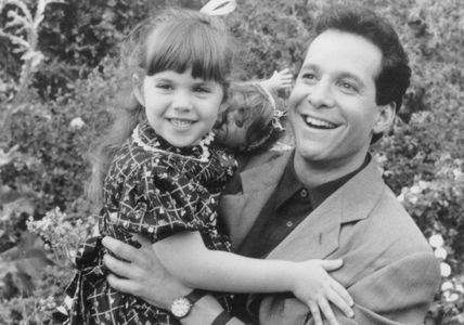 Steve Guttenberg and Robin Weisman in Three Men and a Little Lady (1990)