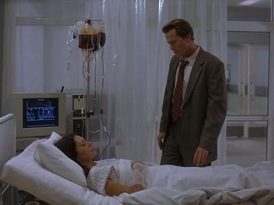 Corin Nemec and Musetta Vander in Mansquito (2005)