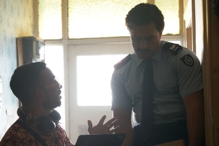 Directing on set of The Panthers