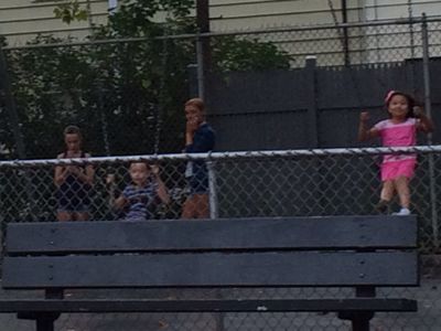 Raina Cheng on playground swing during a shoot of feature film, GOING IN STYLE, starring Alan Arkin, Morgan Freeman & Mi