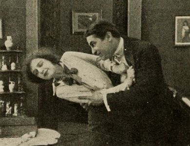 Earl Metcalfe in The Debt (1914)