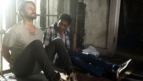 Aaron Tveit and Mahedi Rakib in Graceland (2013)