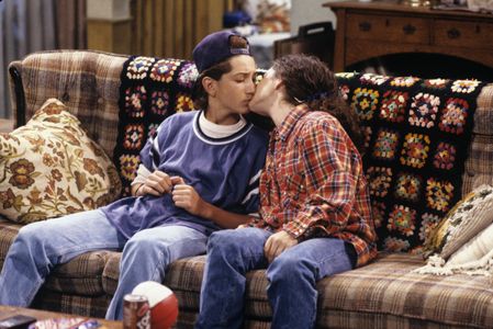 Sara Gilbert and Matt Norero in Roseanne (1988)