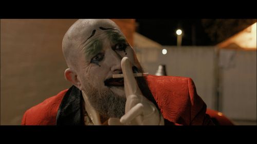 Mike Acosta as The Clown in Blackest Darkness, 