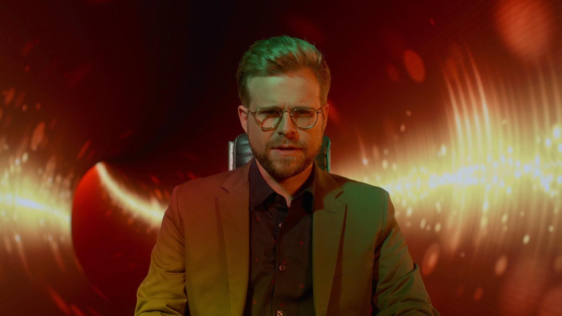 The G Word with Adam Conover background