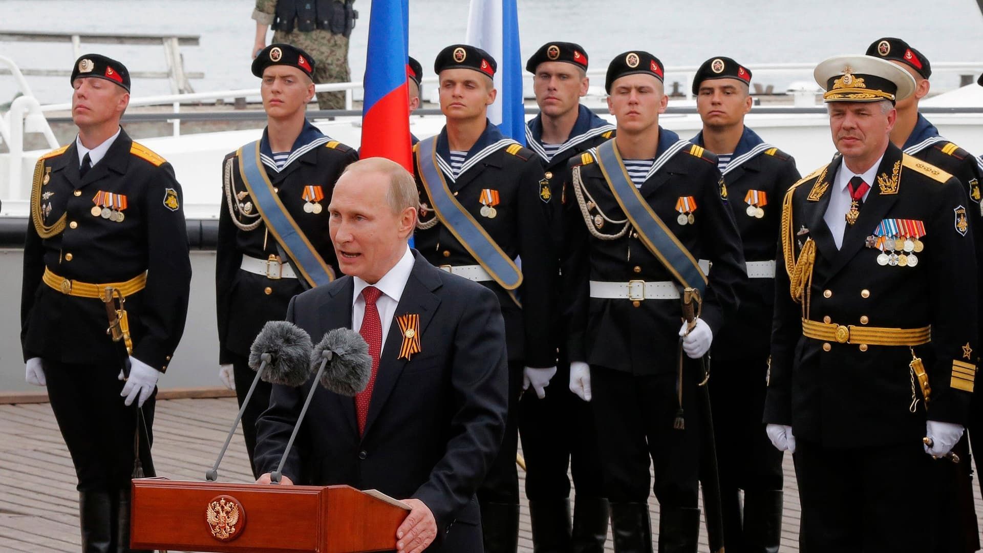 Putin vs the West background