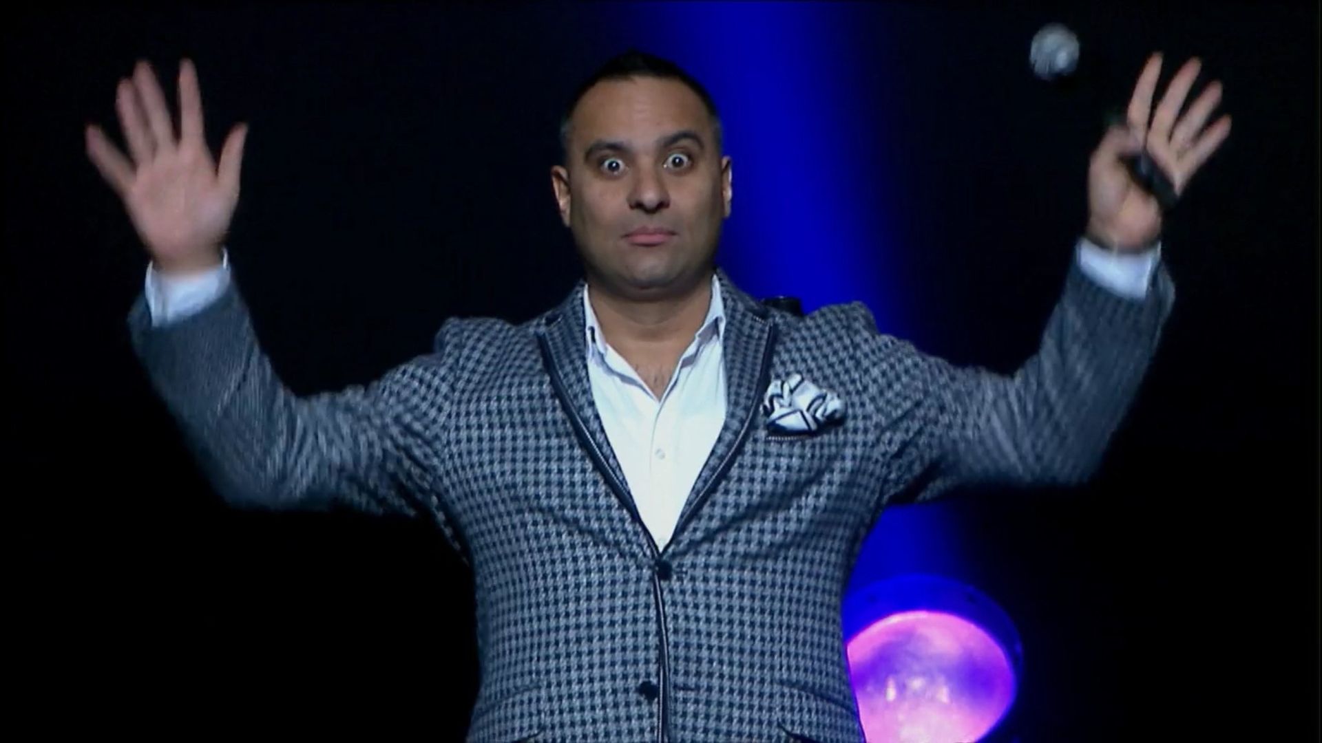 Russell Peters Versus the World background